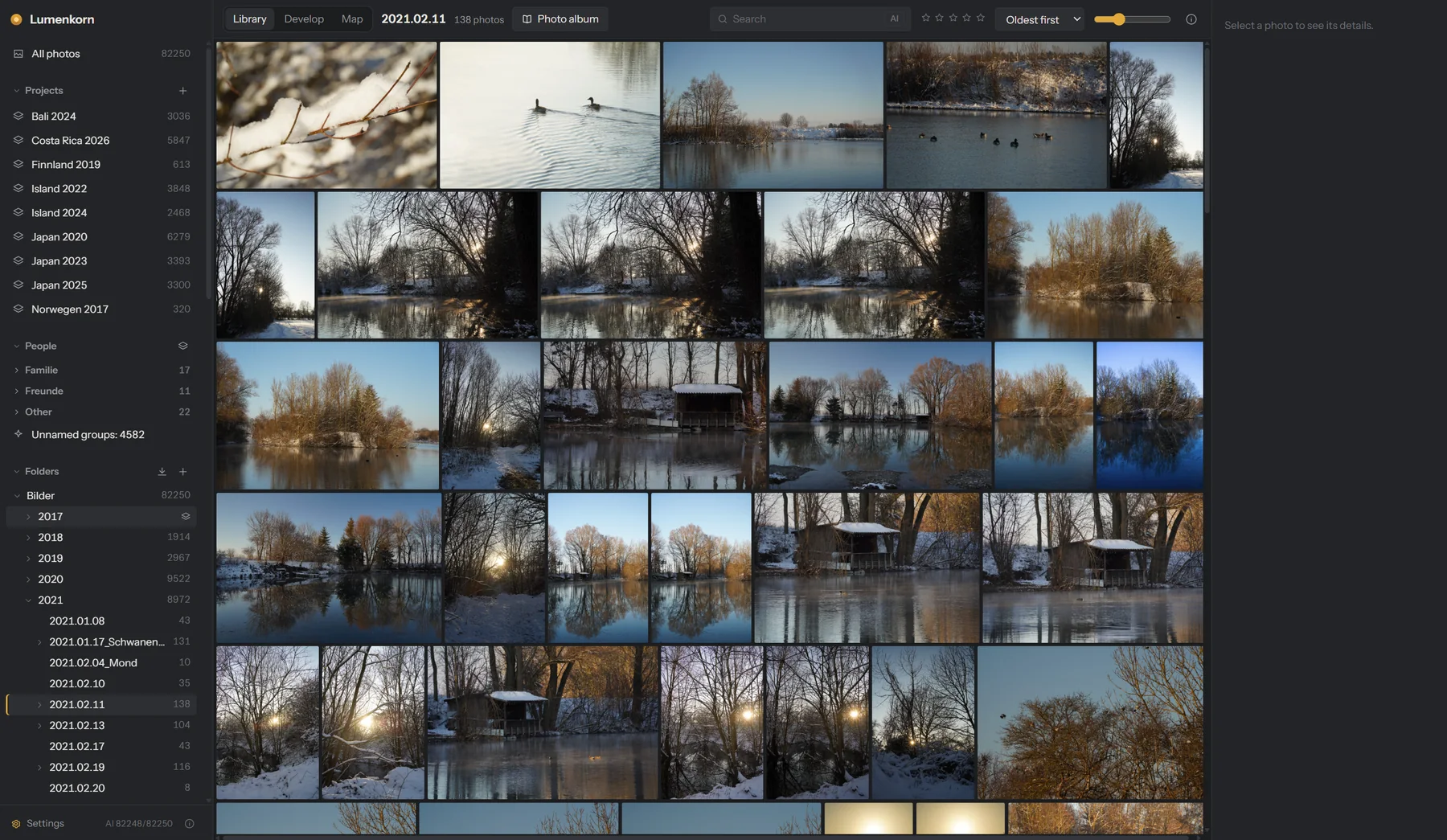 Library with winter photos of a river, in the English interface